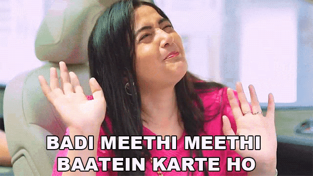 a woman sitting in a car with her hands up and the words badi meethi meethi baatein karte ho