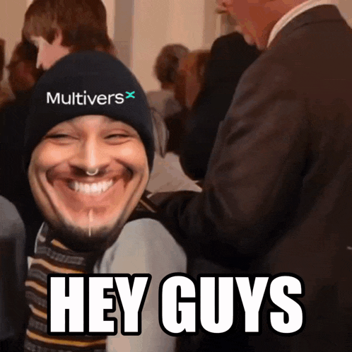 a man wearing a beanie that says multiverse on it