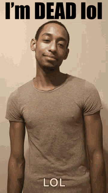 a man in a t-shirt with the words " i 'm dead lol " on the top