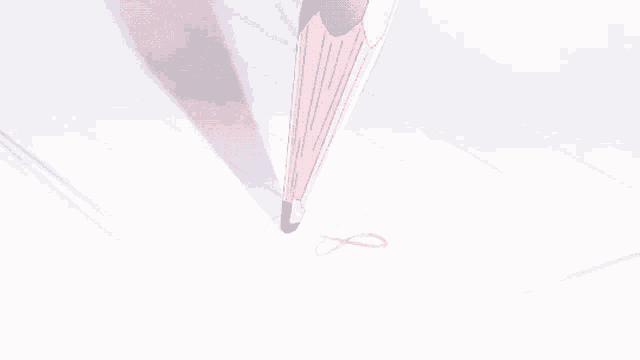 a pink pencil is drawing a circle on a piece of paper