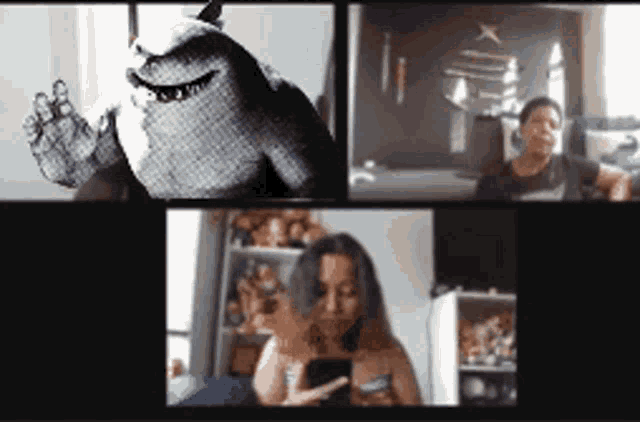 a group of people are having a video call with a stuffed shark in the background