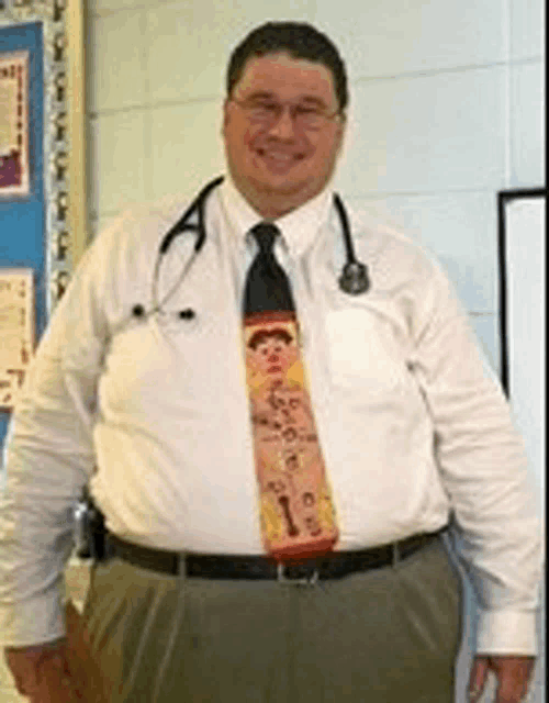 a man wearing a tie and a stethoscope around his neck