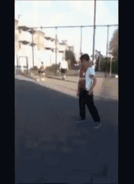 a blurry photo of a person walking on a street