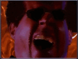 a pixelated image of a man wearing sunglasses with a purple background