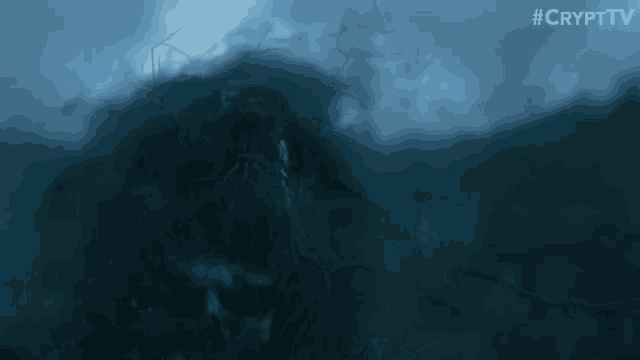 a close up of a monster 's hand reaching out into the water .