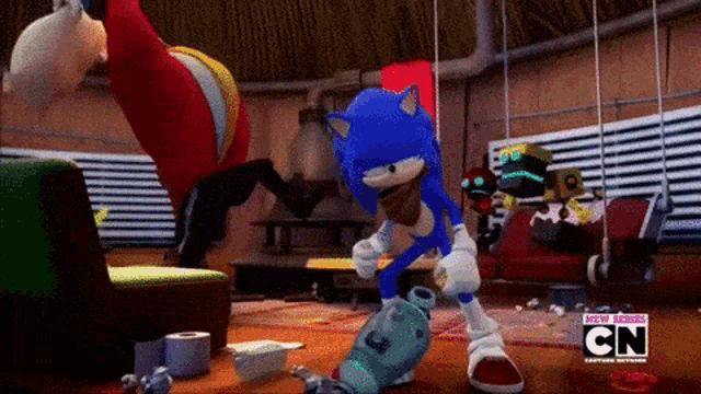 sonic the hedgehog is standing in a room with a vacuum cleaner .