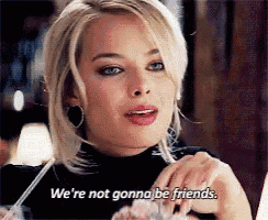 a woman is holding a straw and saying we 're not gonna be friends .
