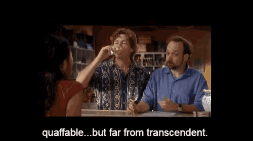 a man sitting at a bar talking to a woman with the words quaffable but far from transcendent on the bottom