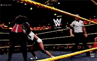 a wrestling match is being broadcasted on wwe.net