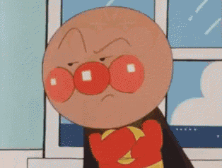 an angry cartoon character with red eyes and a yellow shirt