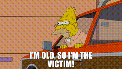 a cartoon character is driving a car and saying `` i 'm old , so i 'm the victim ''