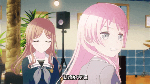 a girl with pink hair is standing next to a girl with brown hair