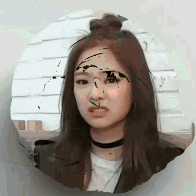 a picture of a woman with a bun on her hair
