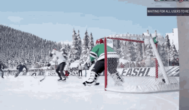 a hockey game is being played in front of a banner that says eashl