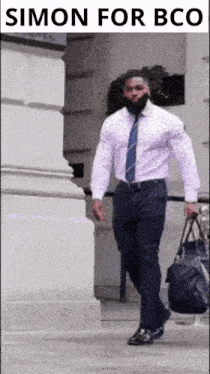 a man in a white shirt and blue tie is walking down stairs with a bag .