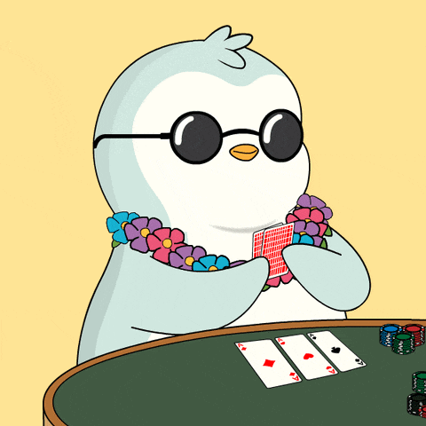 a penguin wearing sunglasses and a lei playing poker