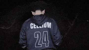 a man wearing a hoodie that says cellium 24