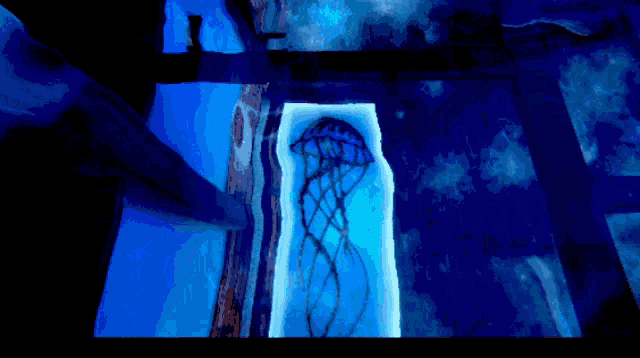 a painting of a jellyfish and fish in the ocean