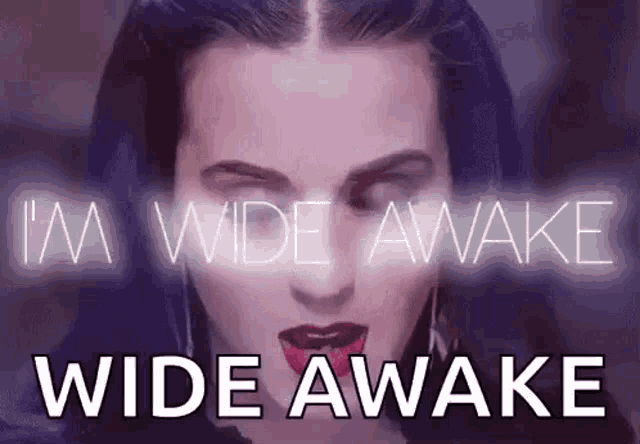 a close up of a woman 's face with the words `` i 'm wide awake wide awake ''