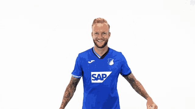 a man in a blue shirt that says sap on it