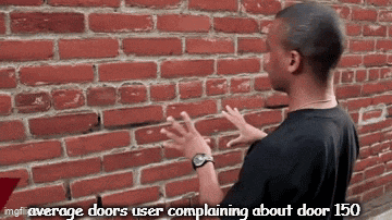 a man is standing in front of a brick wall and talking about door 150