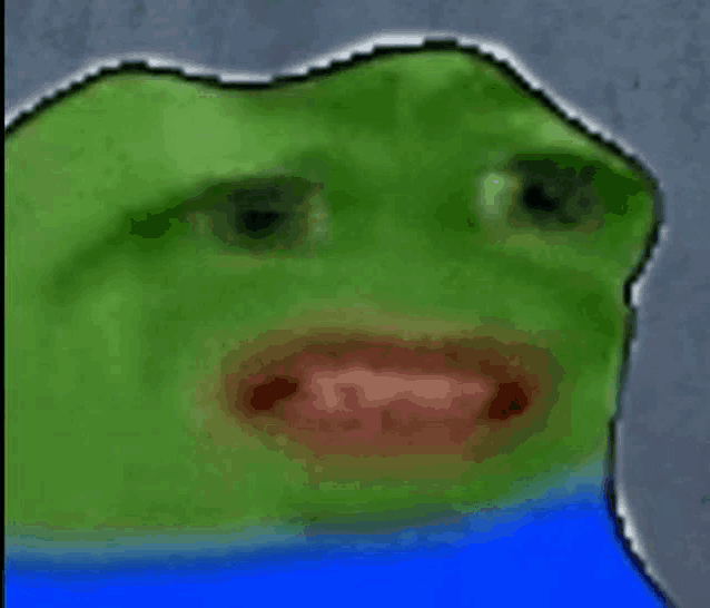 a green frog with a blue shirt on has a red mouth .