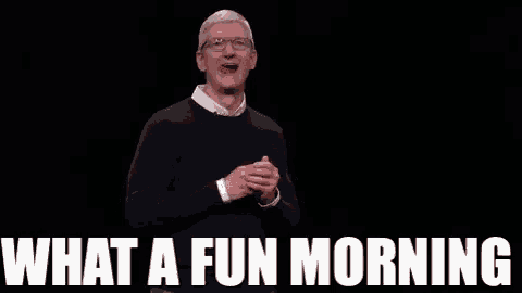 tim cook is giving a speech on a stage with the words `` what a fun morning '' behind him .