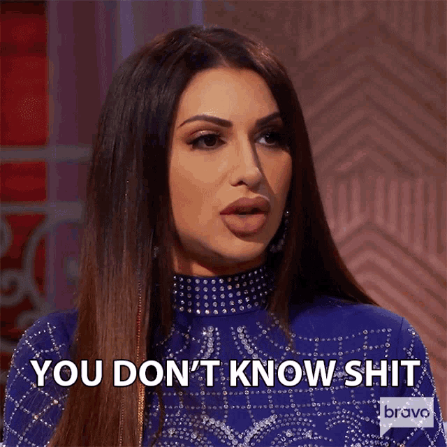 a woman in a blue dress says you don t know shit