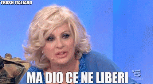 a woman says ma dio ce ne liberi in a foreign language