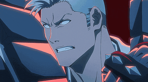 a close up of a man 's face with a very angry look on his face