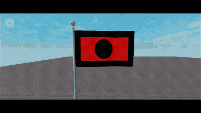 a red and black flag with a black circle in the center