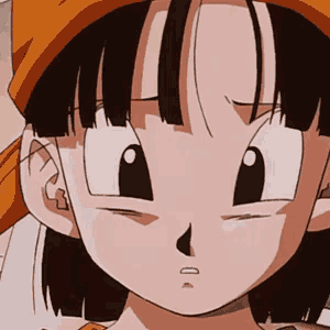 a close up of a cartoon character 's face with a sad look on her face .