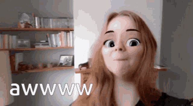 a woman with big eyes is making a cartoon face with the words awwww behind her