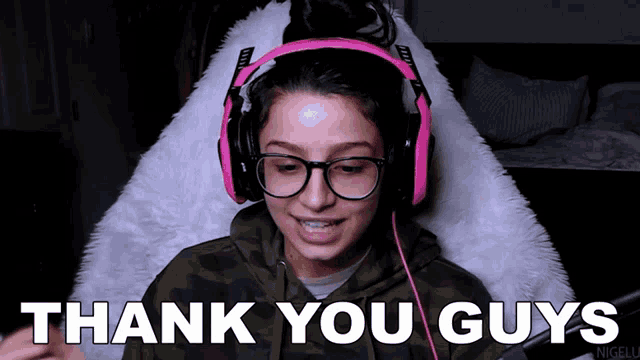 a woman wearing headphones says " thank you guys "