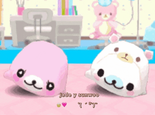 a pink and white stuffed animal with the name jade y sunwoo on the bottom