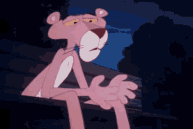 a pink panther is sitting on a bench with his eyes closed