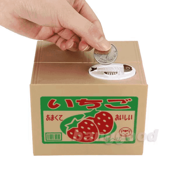 a person is putting a coin into a piggy bank that says strawberry on it