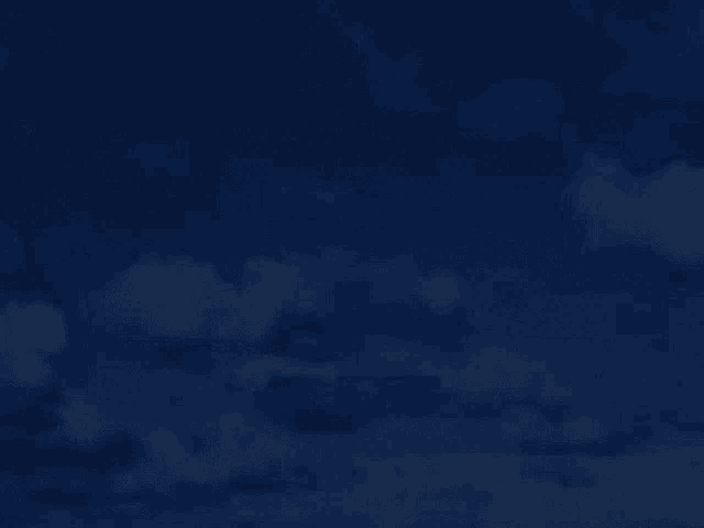the word aro is floating in the sky with clouds