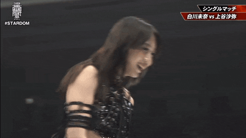 two women in a wrestling ring with #stardom in the corner