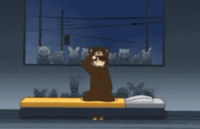 a person in a teddy bear costume sits on a bed in front of a window