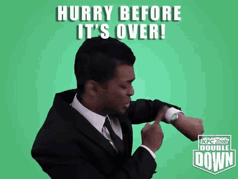 a man in a suit and tie is looking at his watch with the words hurry before it 's over .