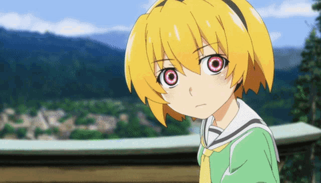a girl with yellow hair has red eyes