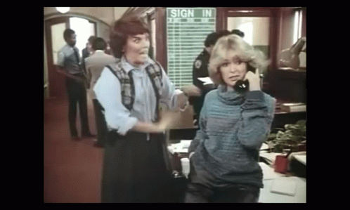 Cagney And Lacey Calling GIF - Cagney And Lacey Calling Stop GIFs