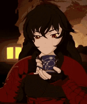 a girl with black hair is holding a cup in her hand