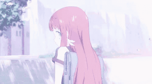 a girl with long pink hair is standing in front of a building .