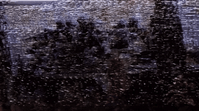 a blurred image of a body of water with bubbles