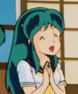 a cartoon girl with blue hair is smiling and praying with her hands together .