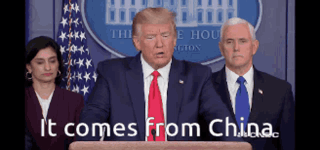 donald trump stands at a podium with the words it comes from china below him
