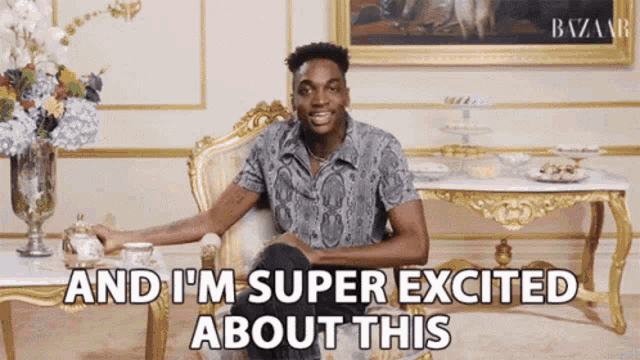 a man is sitting in a chair with the words " and i 'm super excited about this " above him