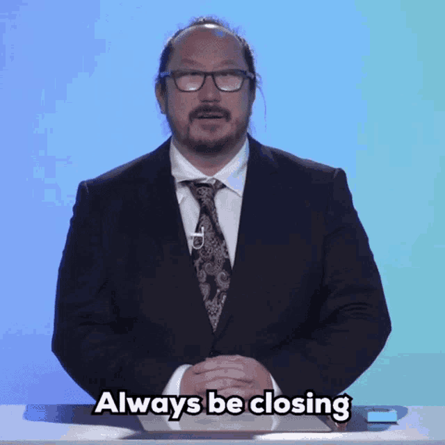 a man in a suit and tie says that he is always closing